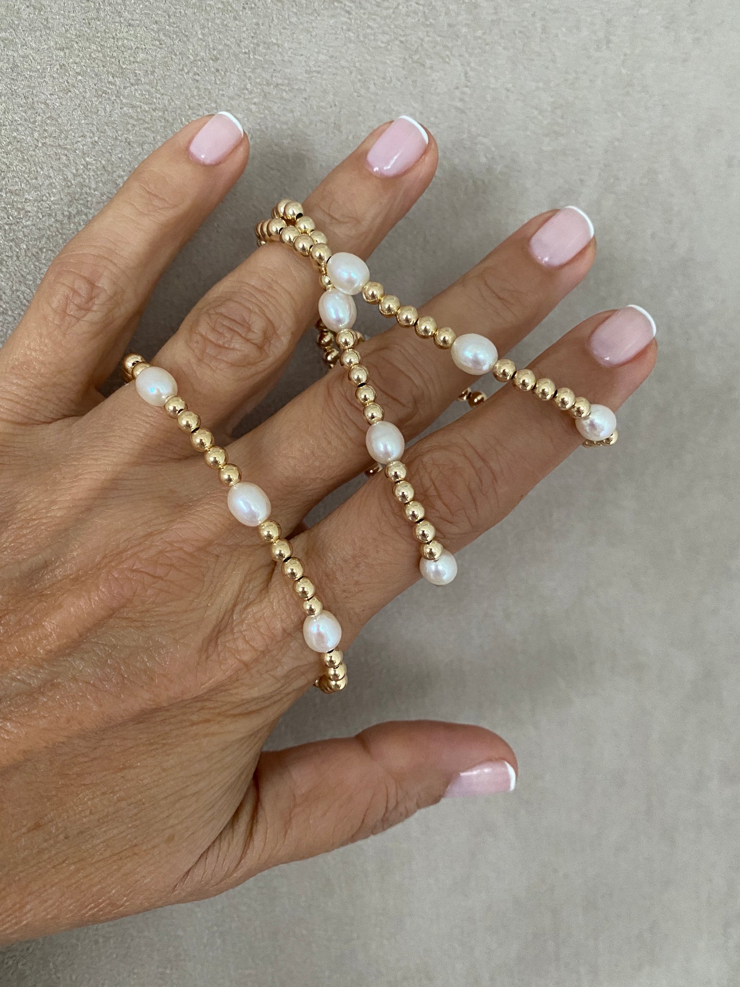 Gold ball and oval pearl bracelet in 14KT Gold filled.