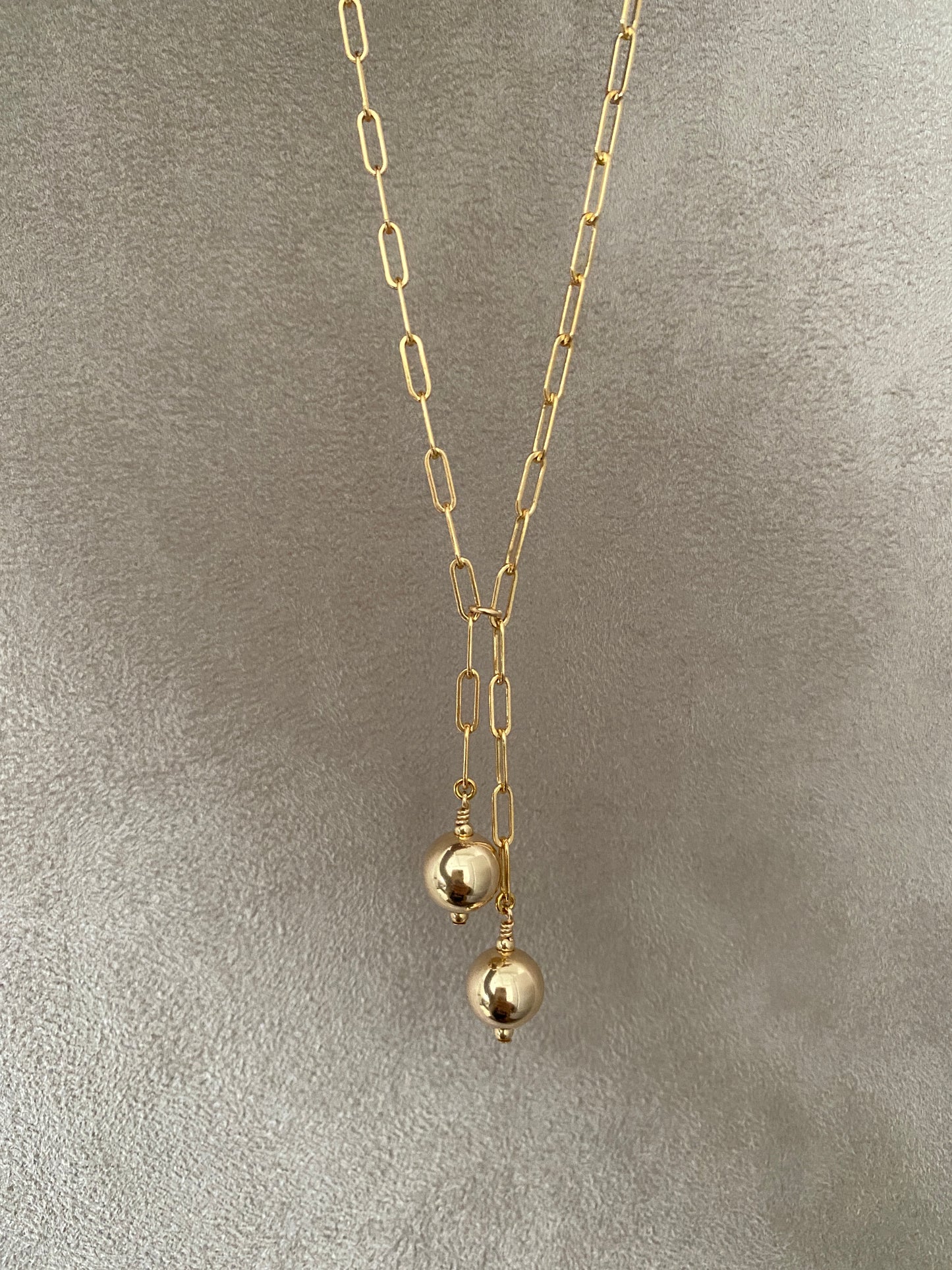 Double ball Lariat necklace in 14KT Gold filled.
