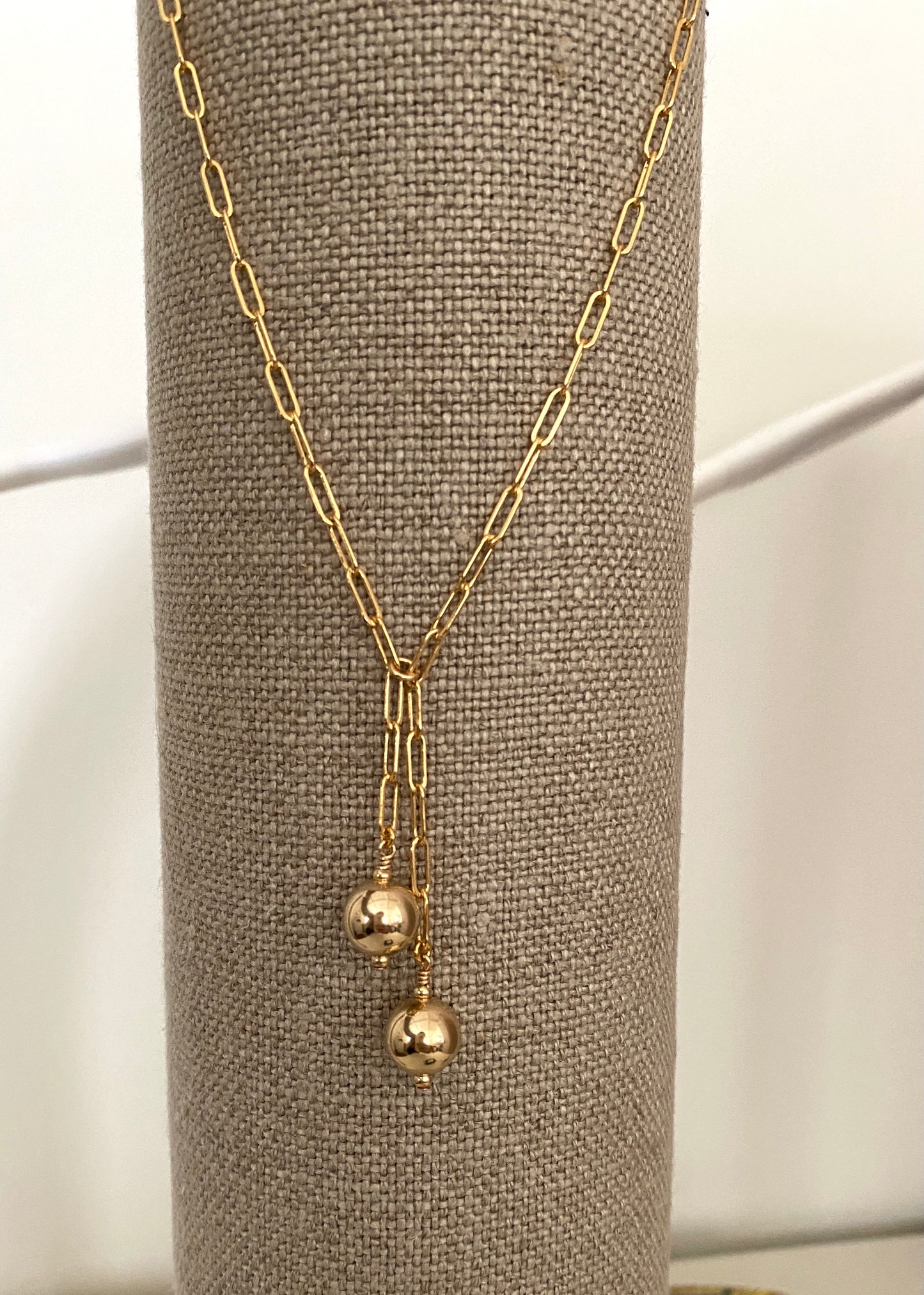 Double ball Lariat necklace in 14KT Gold filled.