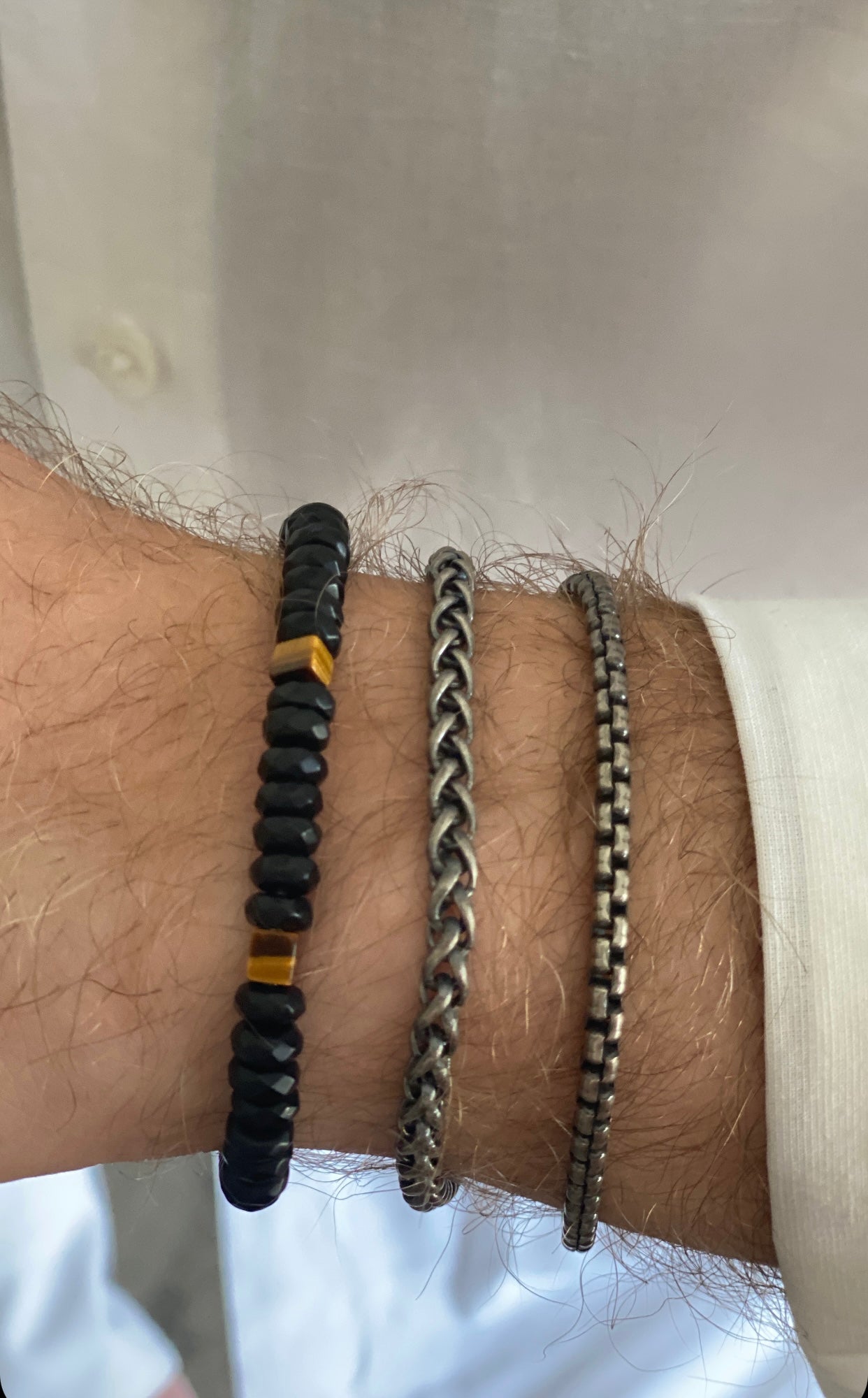 The Hudson wheat chain bracelet in oxidized Sterling silver.