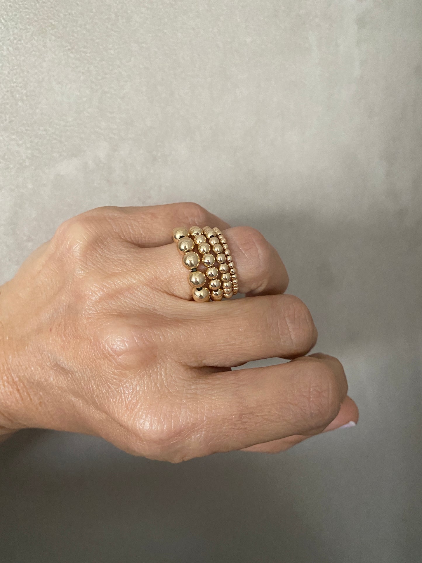 Capri Gold ball stacking rings in 14KT Gold filled.