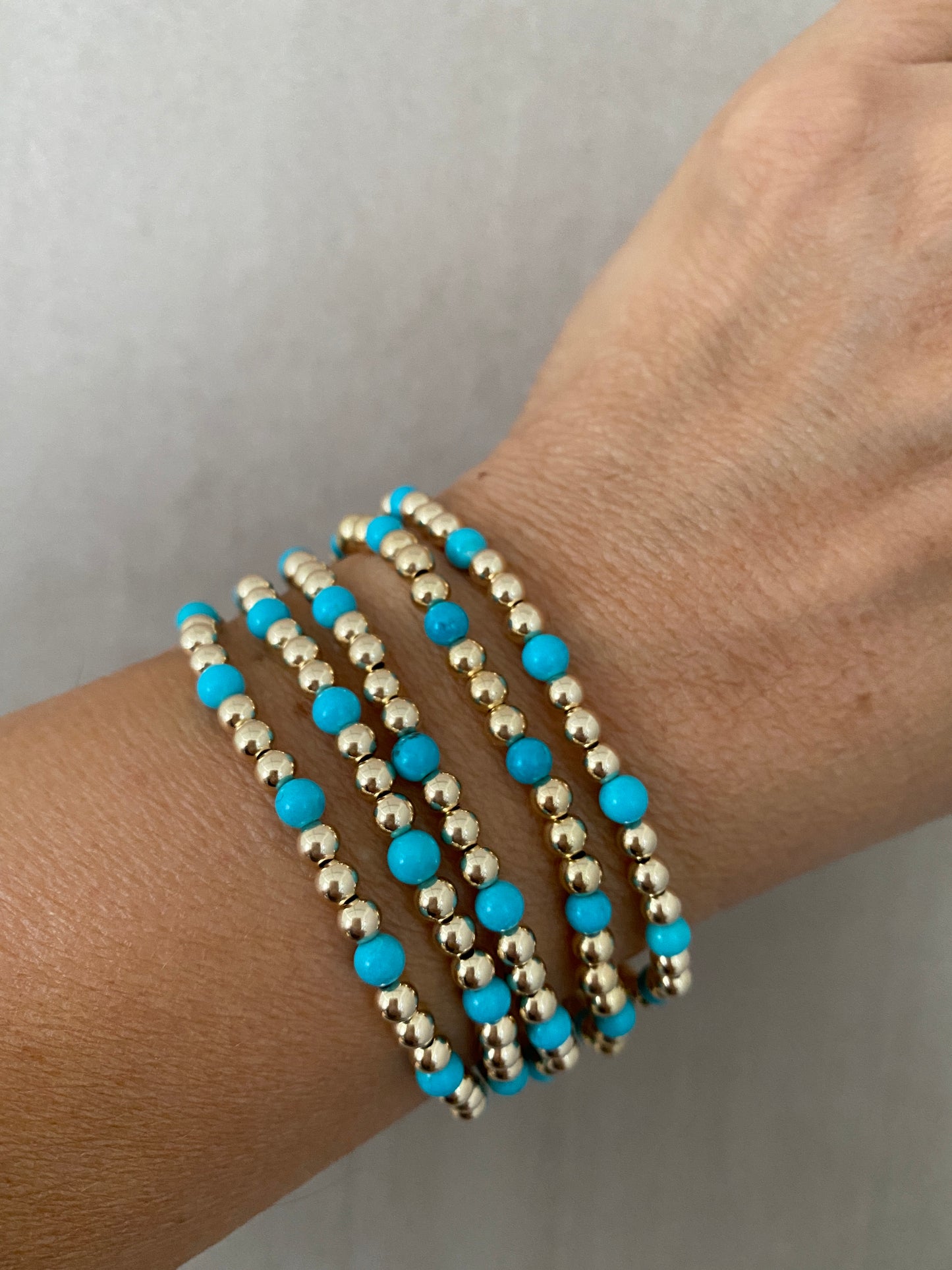 The Elsa Gold ball and Turquoise bracelet in 14KT Gold filled