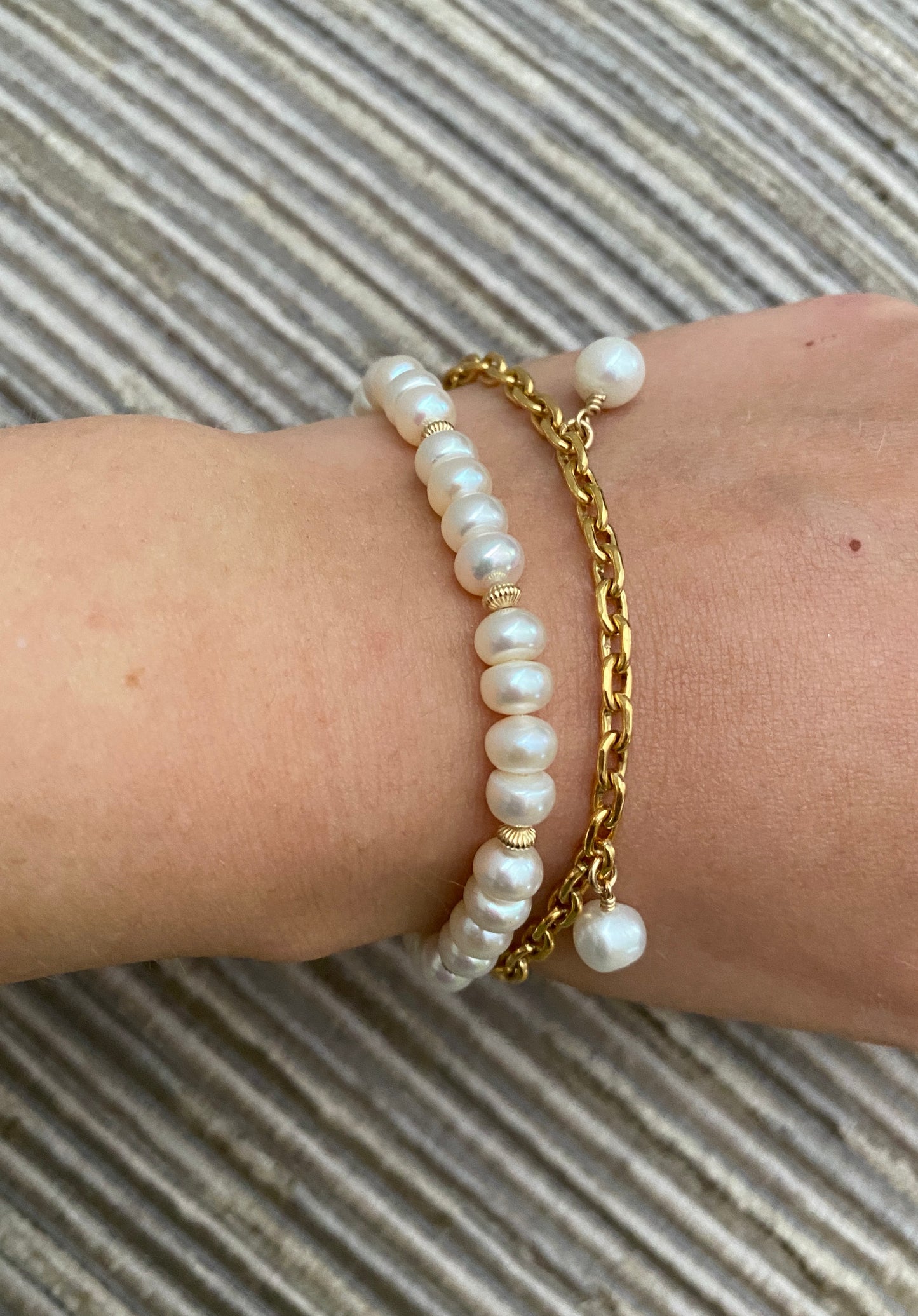 The Charlotte pearl charms bracelet.
