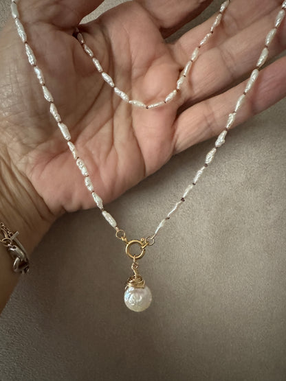The Hana necklace in vintage Japanese pearls.