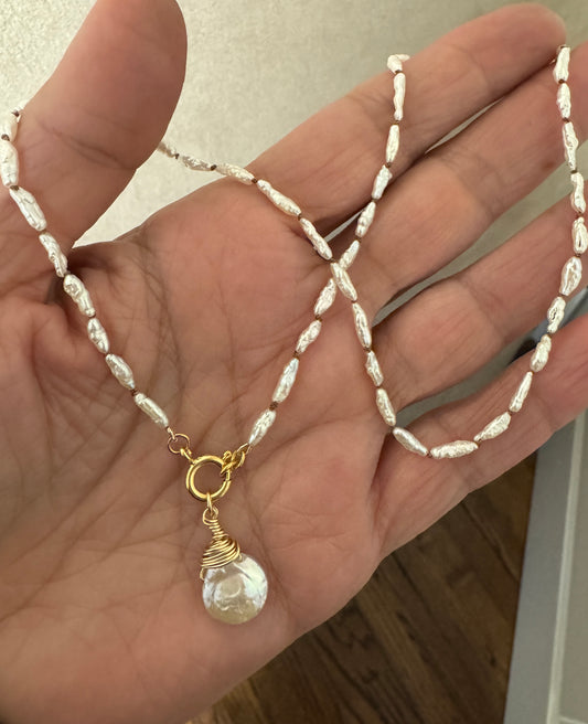 The Hana necklace in vintage Japanese pearls.
